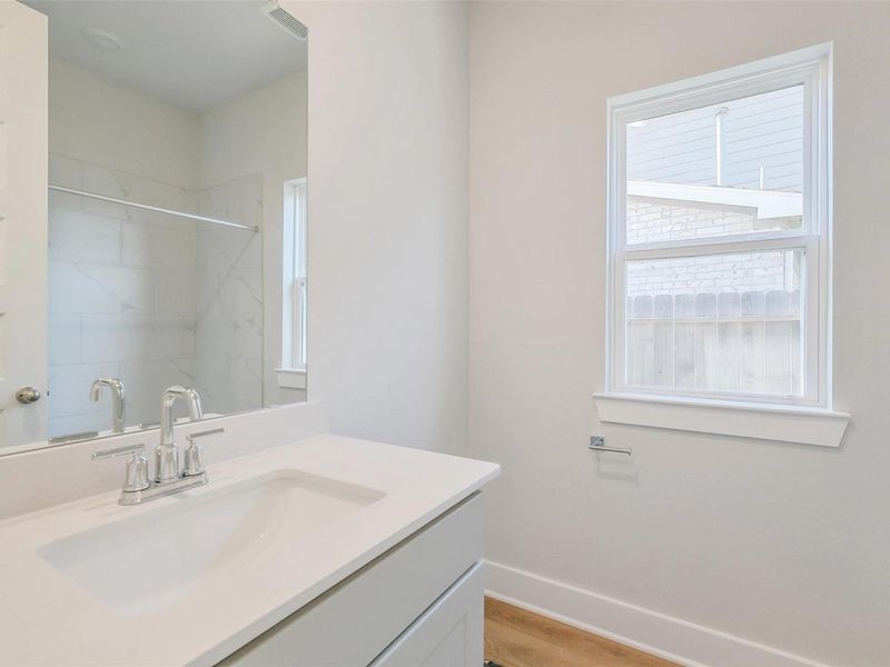 Close-up of interior finishes inside a home in Sunterra, Katy (Image 18).