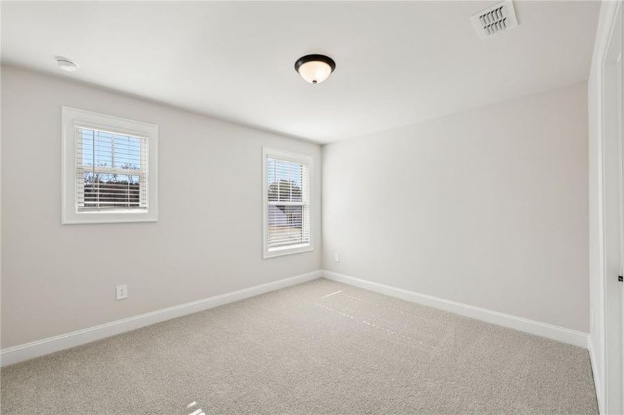 Spacious, unfurnished interior of a new home in River Pointe, Monroe (Image 32).