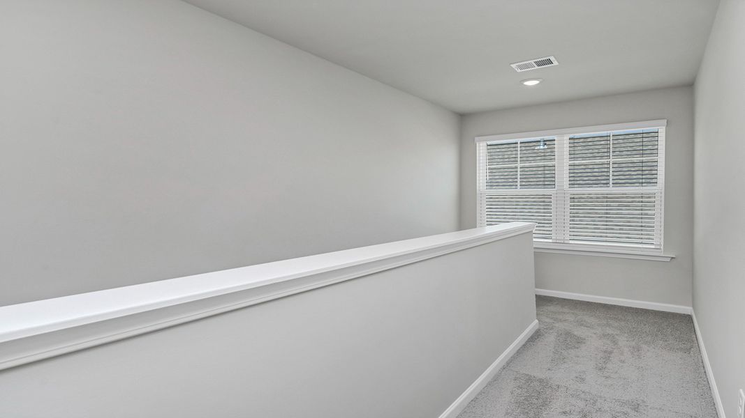 Spacious, unfurnished interior of a new home in Sease's Pond, Gilbert (Image 30).
