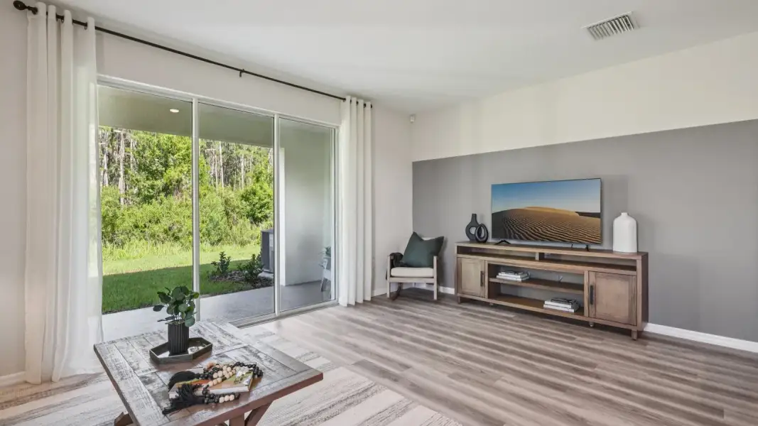 Furnished interior view inside a new home in Towns at Woodsdale, Wesley Chapel (Image 7).