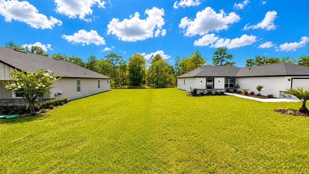 Exterior details and patio area of a home in , Brooksville (Image 3).