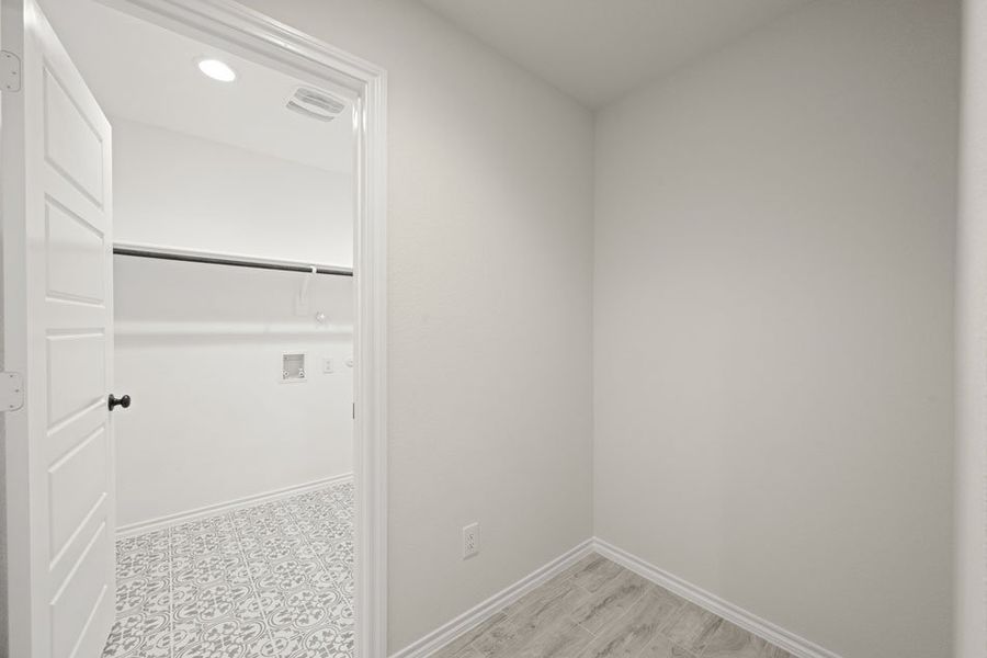 Front exterior of a new home in Baker Farms, Cleburne, TX, highlighting curb appeal (Image 16). Front exterior of a new home in Baker Farms, Cleburne, TX, highlighting curb appeal (Image 16).