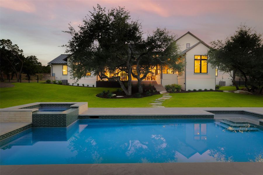 A true Hill Country oasis. This sparkling pool and integrated spa serve as the centerpiece of the backyard, positioned to take full advantage of the greenbelt views. Whether you’re cooling off in the summer or relaxing in the heated spa on a crisp evening, the layout offers a resort-level experience right at home.