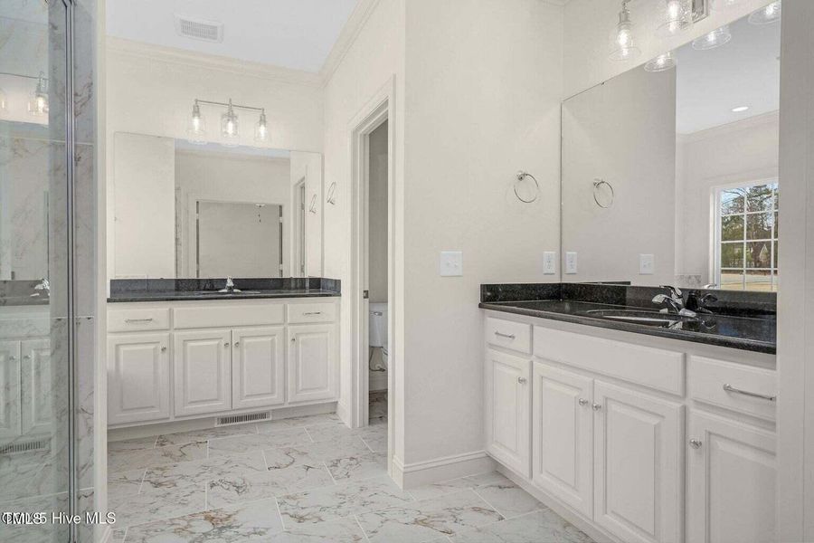 Ceramic flooring, whirl pool tub.