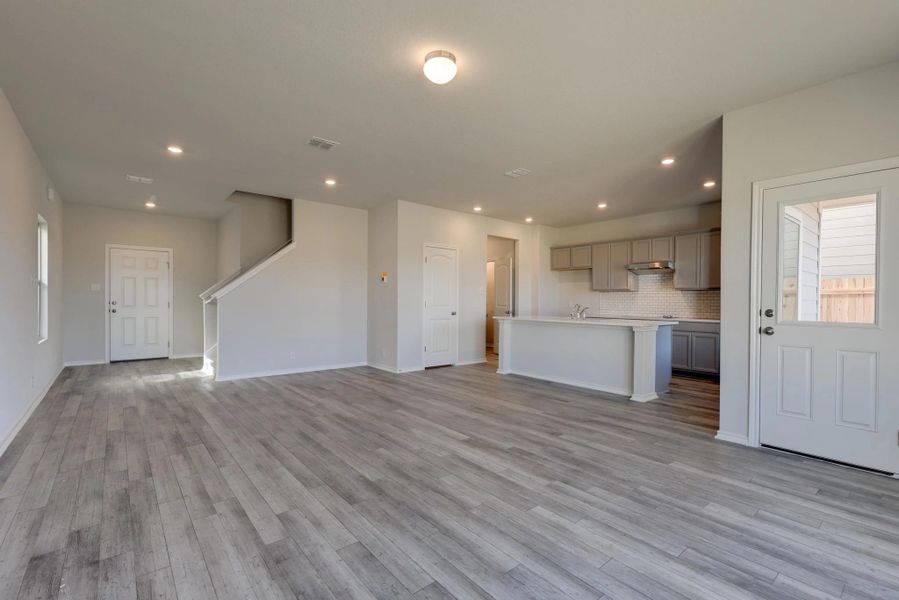Representative unfurnished interior of a home built from the Austin by Ashton Woods in Hennersby Hollow, San Antonio (Image 13). Representative unfurnished interior of a home built from the Austin by Ashton Woods in Hennersby Hollow, San Antonio (Image 13).