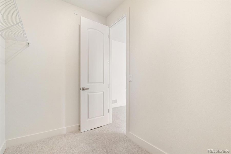 Spacious, unfurnished interior of a new home in Legato, Commerce City (Image 26).