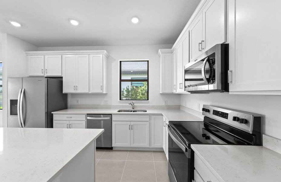 Furnished interior view inside a new home in Del Webb Naples, Ave Maria (Image 9).