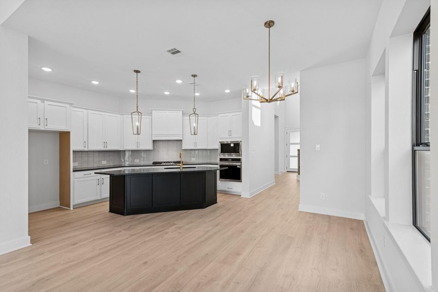 Furnished interior view inside a new home in The Highlands 40', Porter (Image 10).