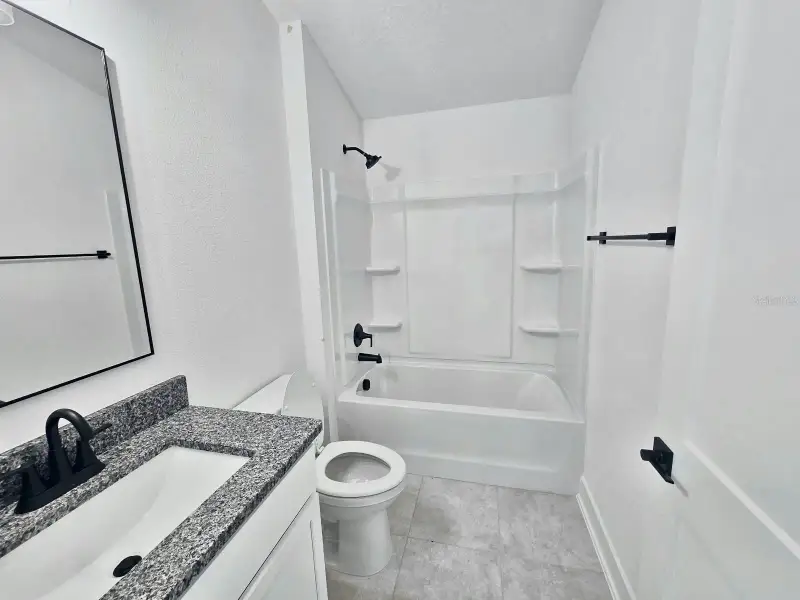 Furnished interior view inside a new home in Harmony Central, St. Cloud (Image 8).