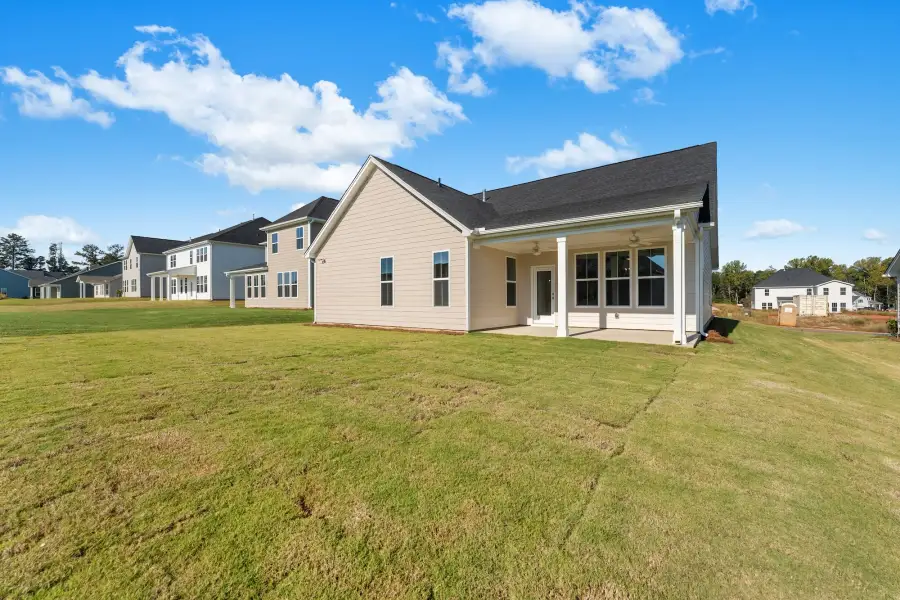 Exterior details and patio area of a home in Cottages at Lake Emory, Inman (Image 3).