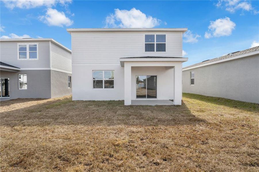 Exterior details and patio area of a home in Watermark, Cocoa (Image 3).