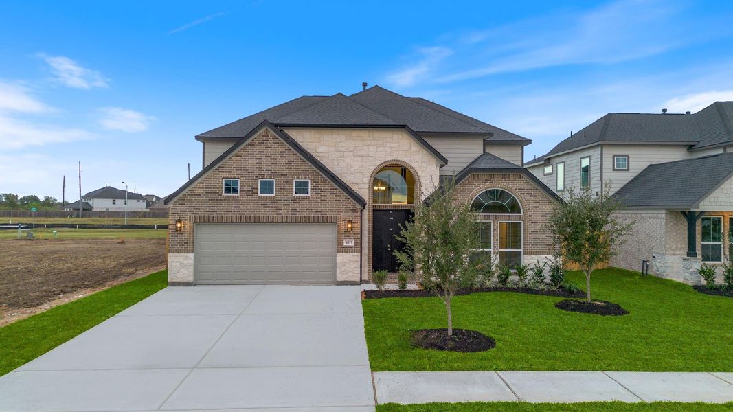 Front exterior of a new home in Briarwood Crossing, Rosenberg, TX, highlighting curb appeal (Image 21).