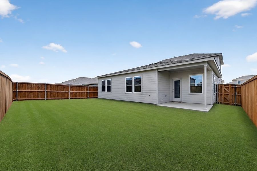 Exterior details and patio area of a home in River Ridge, Crandall (Image 3).