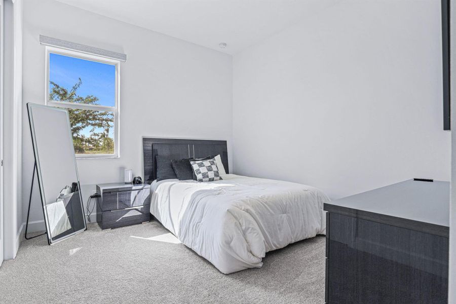 Furnished interior view inside a new home in , Port St. Lucie (Image 26).