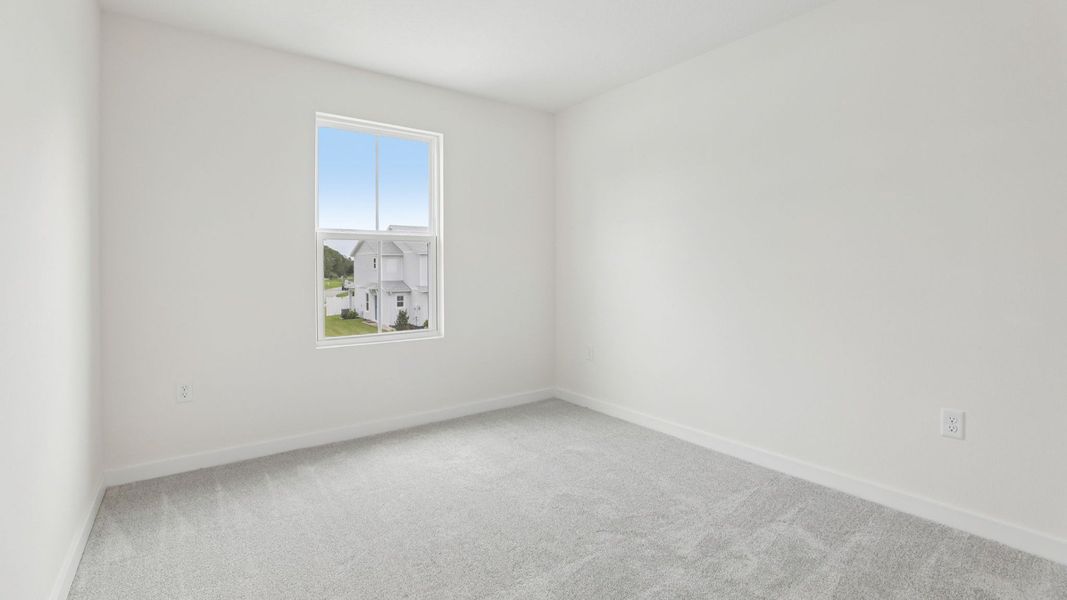 Furnished interior view inside a new home in Cyrene at Harmony, St. Cloud (Image 37).