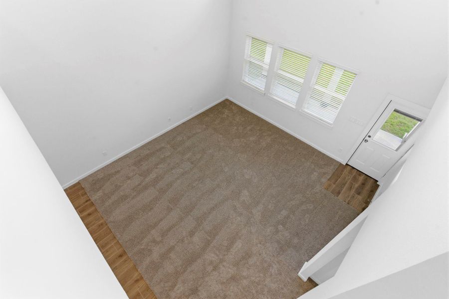 Spacious, unfurnished interior of a new home in , Iowa Colony (Image 38).