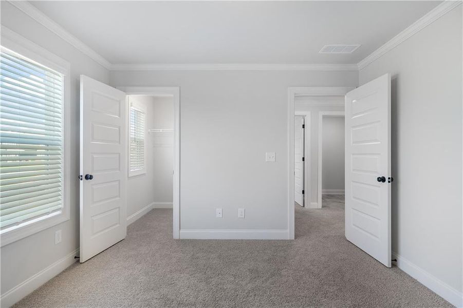 Spacious, unfurnished interior of a new home in Calgary Downs, Winder (Image 8).