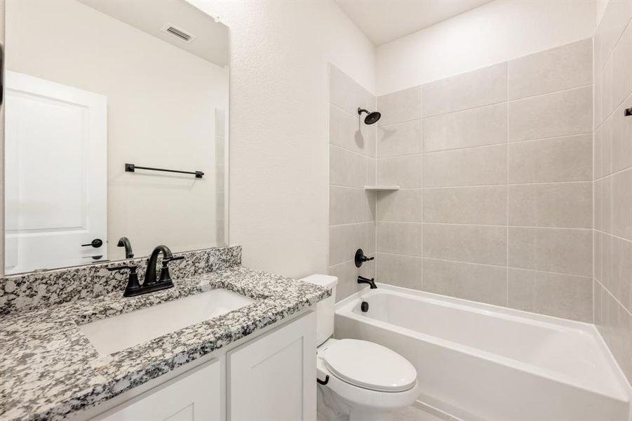 Furnished interior view inside a new home in Mockingbird Hills 60-65, Joshua (Image 9).