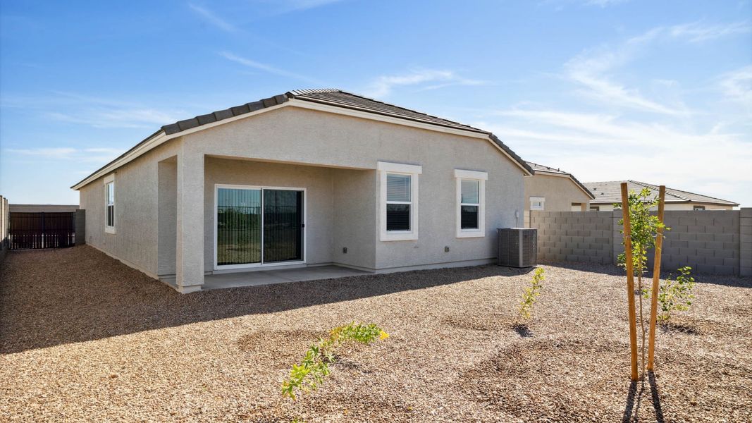 Front exterior of a new home in Copper Falls, Buckeye, AZ, highlighting curb appeal (Image 2).