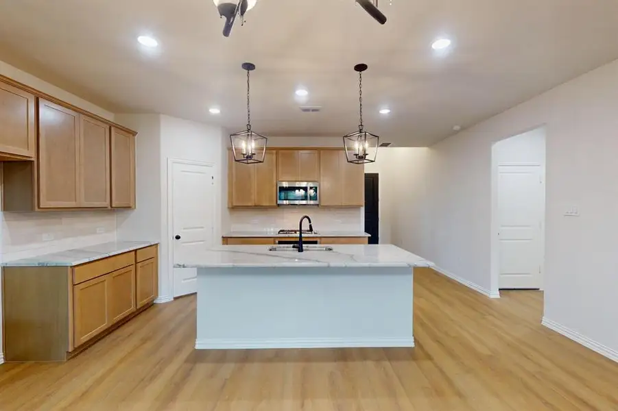Furnished interior view inside a new home in Lilybrooke at Legacy Hills, Celina (Image 10). Furnished interior view inside a new home in Lilybrooke at Legacy Hills, Celina (Image 10).