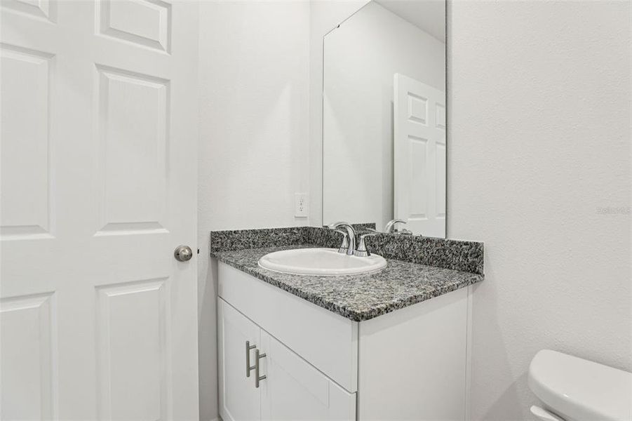 Furnished interior view inside a new home in Lawson Dunes - Signature Series, Haines City (Image 12).