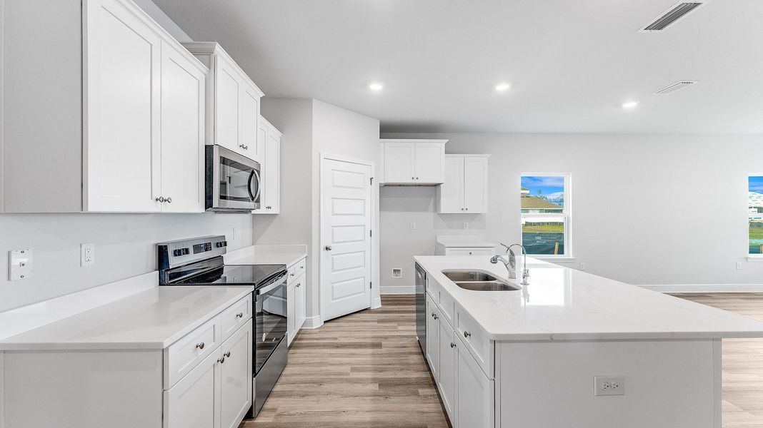 Representative furnished interior of a home built from the The Riverside by D.R. Horton in Hodges Bayou Plantation, Panama City (Image 8).
