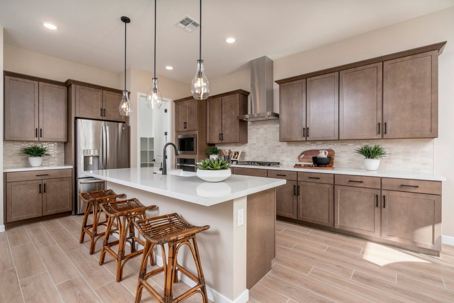 Representative furnished interior of a home built from the Falcon by Risewell Homes in Citrus Park, Goodyear (Image 9).