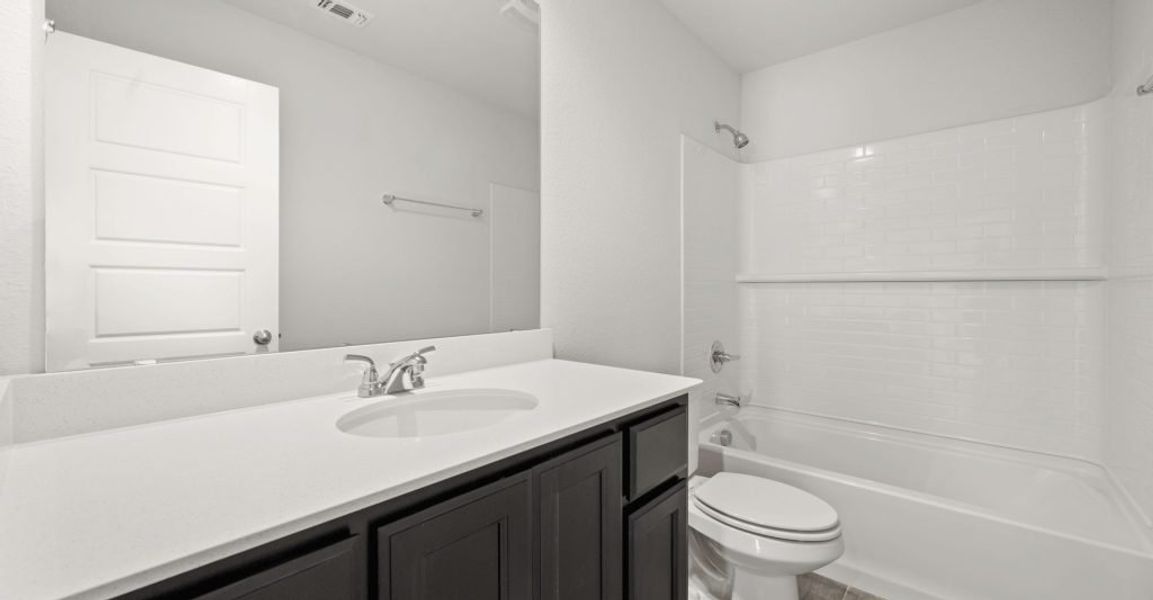 Representative exterior photo of a completed home built from the Pembridge II by Impression Homes in Mountain Valley, Burleson, TX (Image 21). Representative exterior photo of a completed home built from the Pembridge II by Impression Homes in Mountain Valley, Burleson, TX (Image 21).