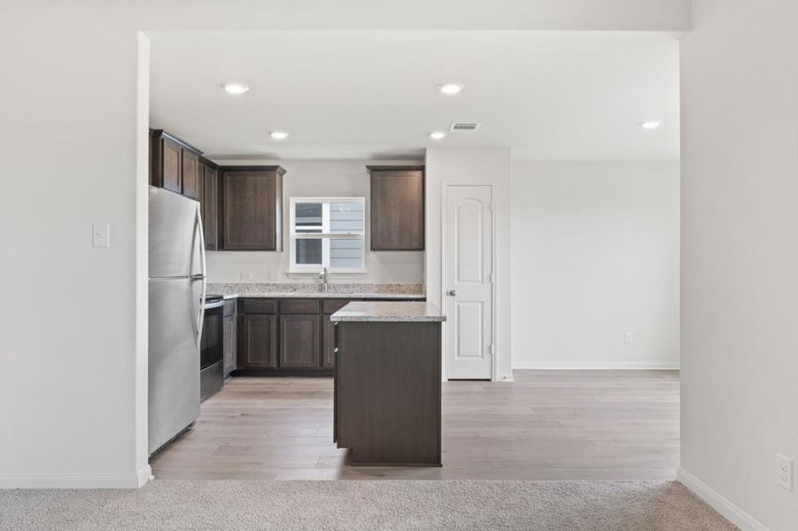 Furnished interior view inside a new home in Retreat at Fossil Creek, Fort Worth (Image 4).