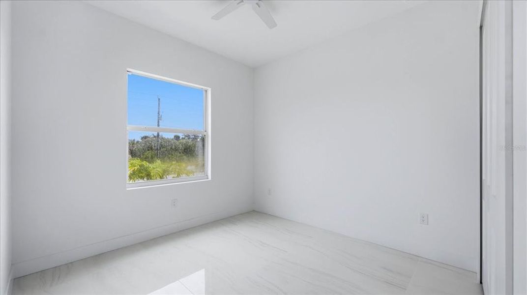 Spacious, unfurnished interior of a new home in , Port Charlotte (Image 34).