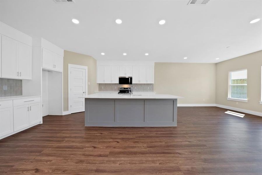 Furnished interior view inside a new home in , The Colony (Image 5).