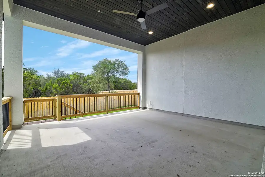 Exterior details and patio area of a home in Kinder Ranch 70's, San Antonio (Image 14).