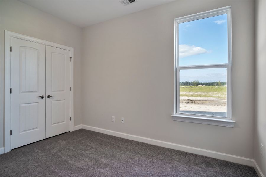 Representative unfurnished interior of a home built from the The Jasmine by Chesapeake Homes in Coastal Club of the Carolinas, Calabash (Image 35).