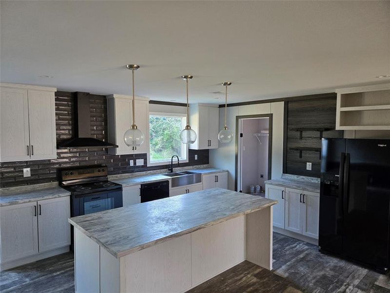 Furnished interior view inside a new home in , Pelican Bay (Image 5).