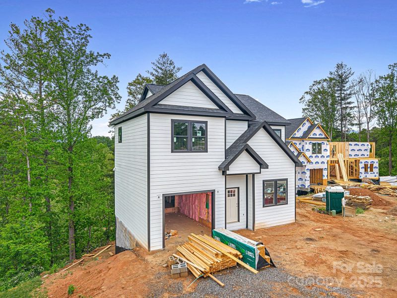 Front exterior of a new home in , Asheville, NC, highlighting curb appeal (Image 2). Front exterior of a new home in , Asheville, NC, highlighting curb appeal (Image 2).
