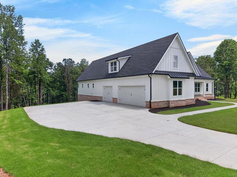Front exterior of a new home in , Fairmount, GA, highlighting curb appeal (Image 28). Front exterior of a new home in , Fairmount, GA, highlighting curb appeal (Image 28).