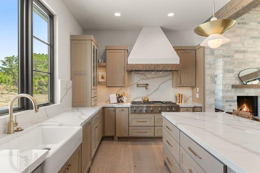 A chef's kitchen featuring premium Thermador appliances. A chef's kitchen featuring premium Thermador appliances.