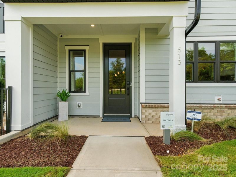 Covered front porch and entry. *Model Photos | Orientation and structural selections may vary.