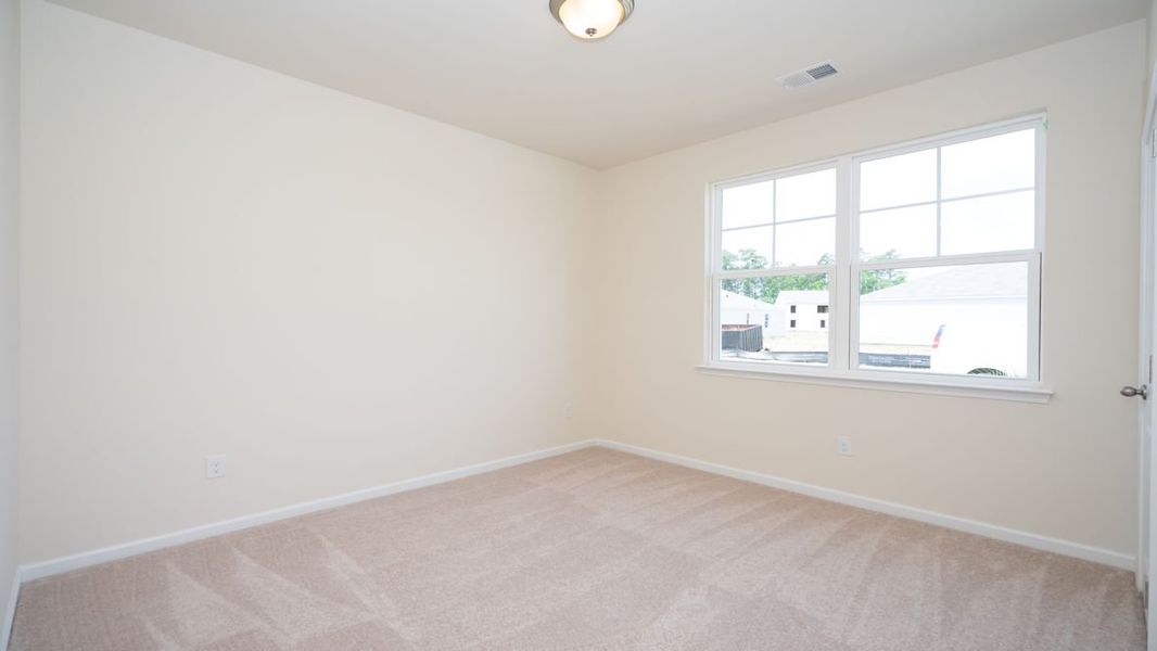 Representative unfurnished interior of a home built from the CALI by D.R. Horton in Lochaven, Conway (Image 17).