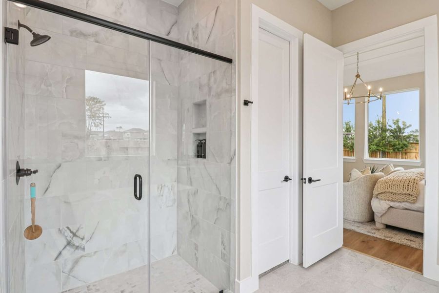 Representative furnished interior of a home built from the Lauren by Chesmar Homes in Grange, Katy (Image 17).