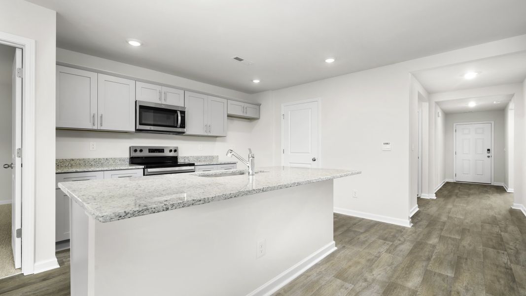 Representative furnished interior of a home built from the Aria by D.R. Horton in Waverly Place, Linwood (Image 5).