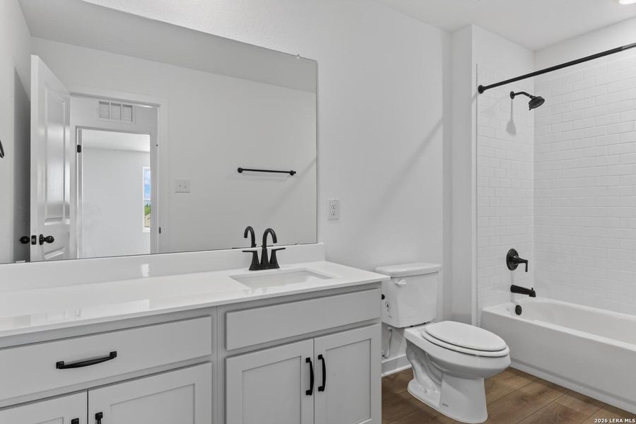 Furnished interior view inside a new home in Nopal Valley, San Antonio (Image 16).