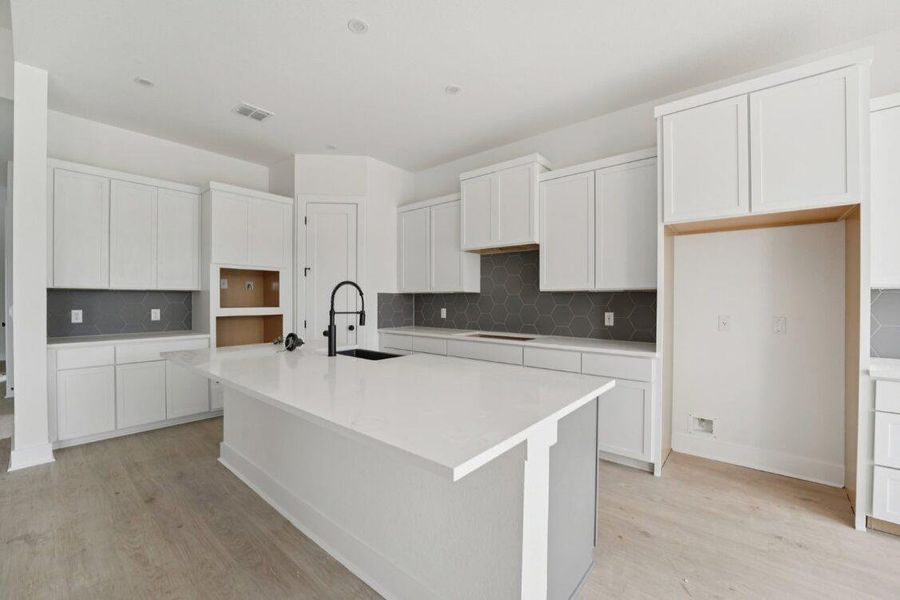 Photos are of a completed model of the same floor plan and are for illustrative purposes only. Actual home is under construction and design selections, materials, and features may differ. Confirm final specifications with the New Home Consultant. Photos are of a completed model of the same floor plan and are for illustrative purposes only. Actual home is under construction and design selections, materials, and features may differ. Confirm final specifications with the New Home Consultant.