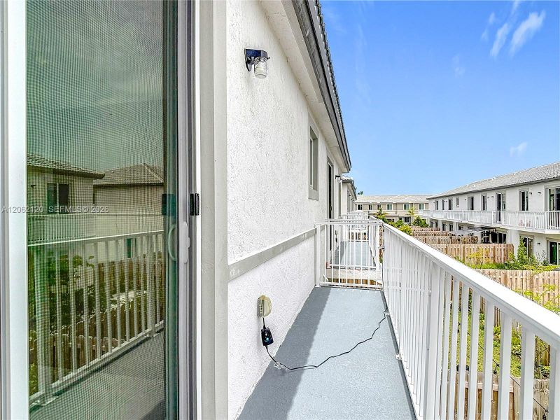 Exterior details and patio area of a home in , Homestead (Image 3).