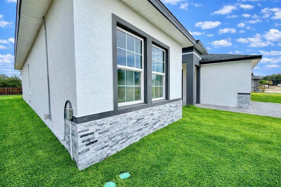 Exterior details and patio area of a home in , Ocala (Image 21).