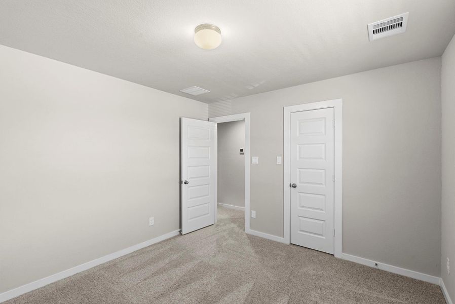 Spacious, unfurnished interior of a new home in Grand Oaks Village, Houston (Image 25).