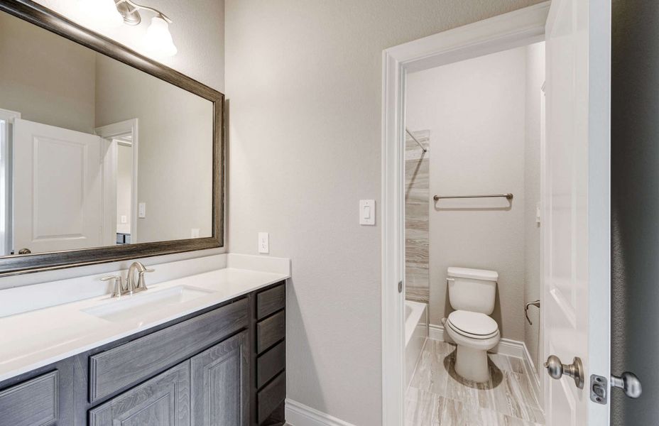 Representative furnished interior of a home built from the 2924 by Ravenna Homes in The Highlands 55′, Porter (Image 12). Representative furnished interior of a home built from the 2924 by Ravenna Homes in The Highlands 55′, Porter (Image 12).