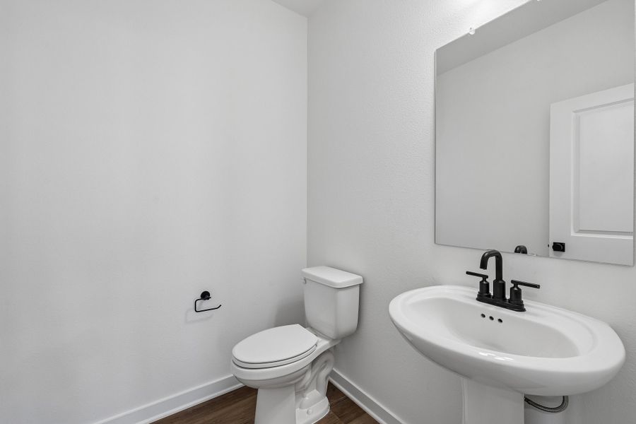 Representative furnished interior of a home built from the 4013 by Risewell Homes in Parkton Square, Kyle (Image 7).