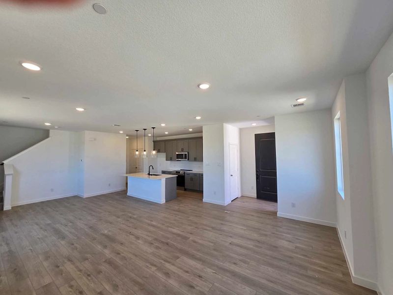 Open Kitchen-Living-Dining Room Construction Progress featuring the Minimalist Collection