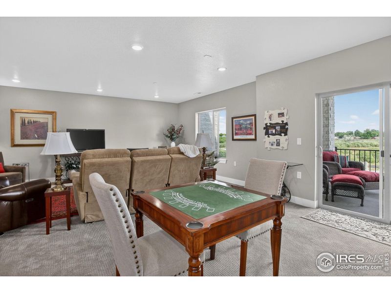 Family Room in Basement with Walk-Out access to covered deck